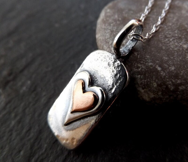 Silver chunky heart necklace , with copper and textured, hammered finish