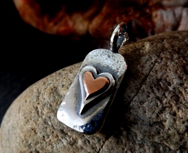 Silver chunky heart necklace , with copper and textured, hammered finish