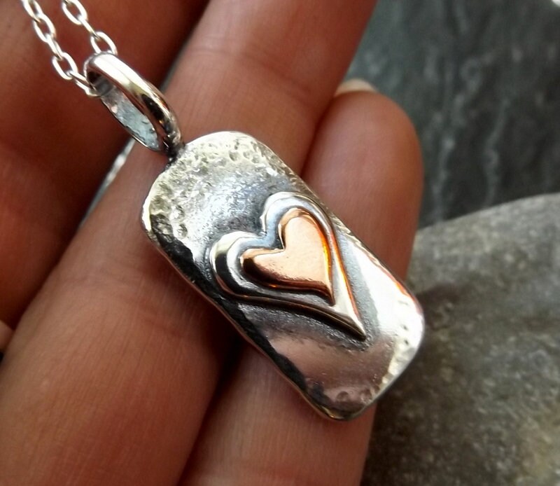 Silver chunky heart necklace , with copper and textured, hammered finish