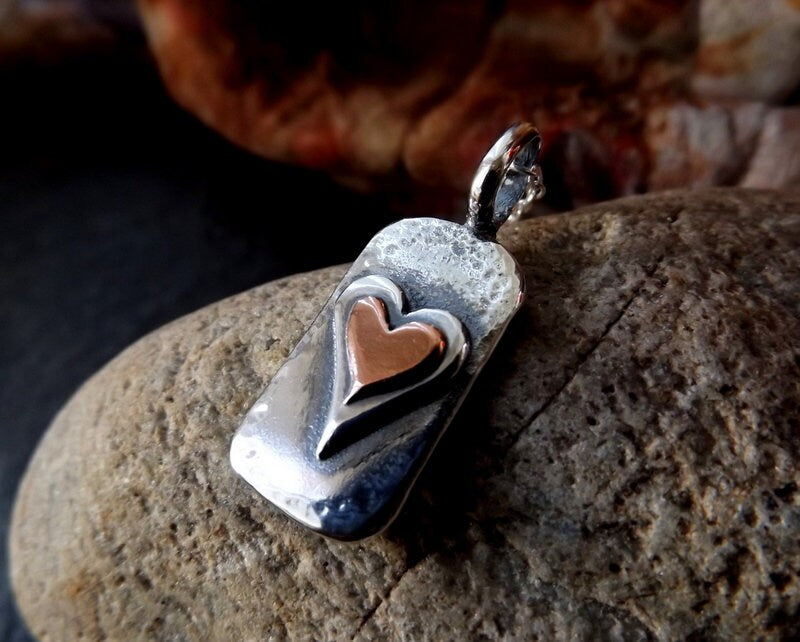 Silver chunky heart necklace , with copper and textured, hammered finish